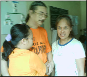 Lau with husband Aris and daughter Roma